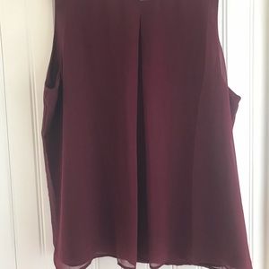 Beautiful burgundy sleeveless top. Pullover with pleat in front